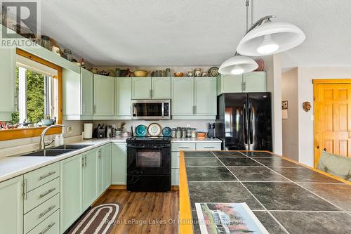 1123 Balmoral Lane, Highlands East (Glamorgan), ON - Indoor Photo Showing Kitchen With Double Sink