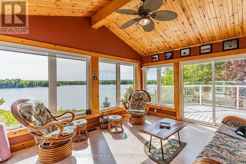 1123 Balmoral Lane, Highlands East (Glamorgan), ON - Indoor Photo Showing Living Room With Body Of Water