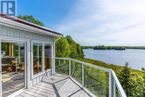 1123 Balmoral Lane, Highlands East (Glamorgan), ON - Outdoor With Body Of Water With Deck Patio Veranda With View