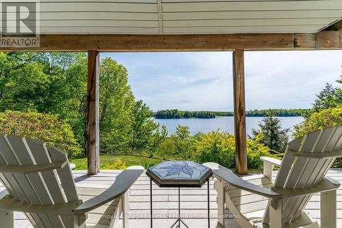 1123 Balmoral Lane, Highlands East (Glamorgan), ON - Outdoor With Body Of Water With Deck Patio Veranda