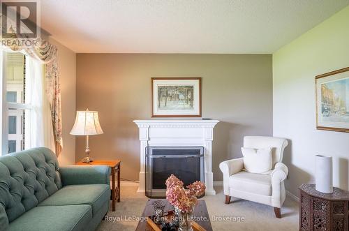 383 Old Surrey Lane, Kawartha Lakes (Bobcaygeon), ON - Indoor Photo Showing Living Room With Fireplace