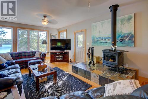 441 B Maccomish Lane, Frontenac (Frontenac South), ON - Indoor Photo Showing Living Room With Fireplace
