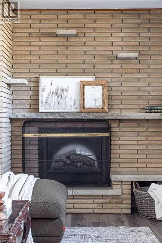 106 Cline Avenue S, Hamilton, ON - Indoor Photo Showing Living Room With Fireplace