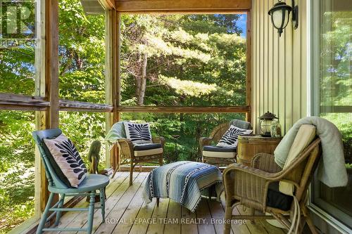 A frame screened in porch - 1622 Concession 4B, Lanark Highlands, ON - Outdoor With Deck Patio Veranda