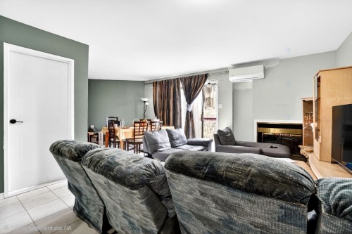 Salon - 321-56 Boul. Bellerose E., Laval (Vimont), QC - Indoor Photo Showing Living Room With Fireplace