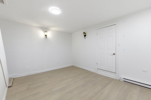 Salle familiale - 11131  - 11133 Av. L'Archevêque, Montréal (Montréal-Nord), QC - Indoor Photo Showing Other Room