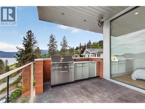 Cantilevered and engineered deck to offset the BBQ area so it doesn't impede the view from inside. - 5835 Vicary Road, Peachland, BC 