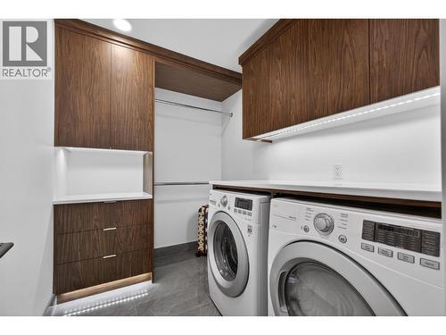 Walk in closet and self contained laundry in Suite. - 5835 Vicary Road, Peachland, BC 