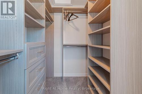 Large walk-in closet with custom built-in wardrobe - 9 Callon Drive, Hamilton (Meadowlands), ON 