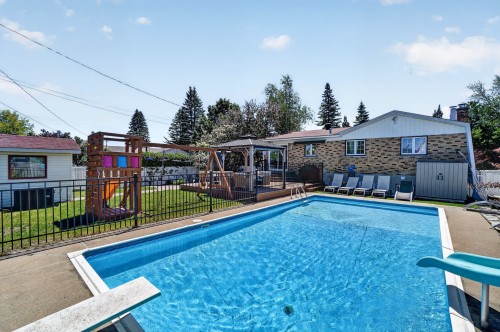 Face arrière - 2625 Rue Cantin, Mascouche, QC - Outdoor With In Ground Pool