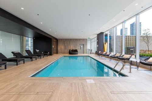 Piscine - 412-1500 Boul. René-Lévesque O., Montréal (Ville-Marie), QC - Indoor Photo Showing Other Room With In Ground Pool