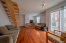 Vue d'ensemble - E-5377 Boul. Milan, Brossard, QC  - Indoor Photo Showing Living Room 