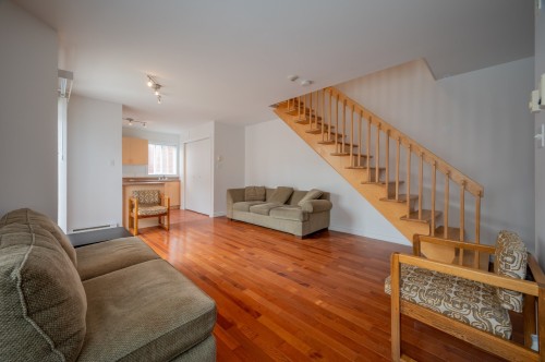 Vue d'ensemble - E-5377 Boul. Milan, Brossard, QC - Indoor Photo Showing Living Room