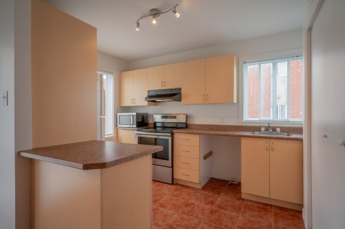 Cuisine - E-5377 Boul. Milan, Brossard, QC - Indoor Photo Showing Kitchen