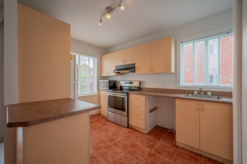 Cuisine - E-5377 Boul. Milan, Brossard, QC - Indoor Photo Showing Kitchen