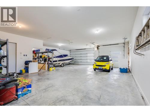 Oversized Triple Car Garage w 9ft Doors - 7235 Dunwaters Road, Kelowna, BC 
