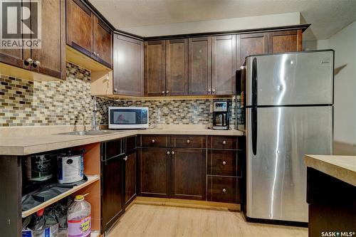 1035 Wallace Street, Regina, SK - Indoor Photo Showing Kitchen With Double Sink