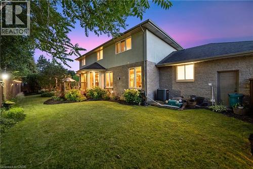 Expansive backyard featuring a manicured lawn, established landscaping with an irrigation system - 7775 St. Augustine Crescent, Niagara Falls, ON 