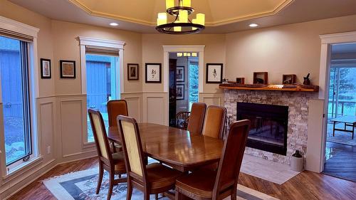 5179 Riverview Road, Fairmont Hot Springs, BC - Indoor Photo Showing Dining Room With Fireplace