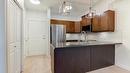 102-3533 Carrington Road, West Kelowna, BC  - Indoor Photo Showing Kitchen With Double Sink 