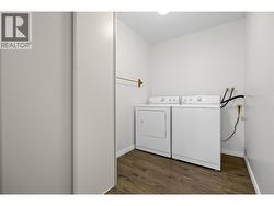 Spacious laundry room with storage closet - 