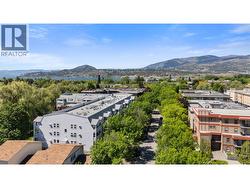 drone overview of the Colonial (left) and tree lined, traffic calmed Sutherland Avenue - 