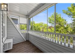 enclosed balcony off living room - 