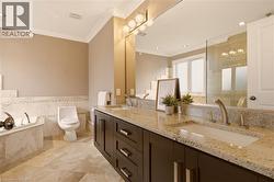 Dual vanity with integrated sinks and granite countertops - 