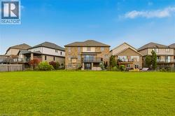 Expansive green space backing onto residential properties - 