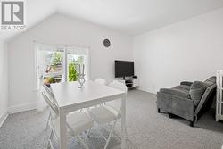 Third Floor Living/Dining (Primary Bedroom) - 