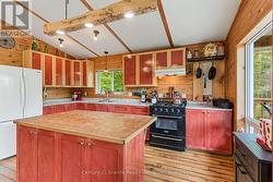 LARGE KITCHEN WITH LOTS OF CABINET SPACE - 