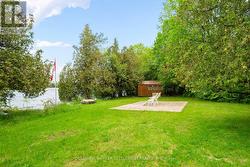 Shed with power by the lake. - 
