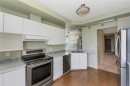 #1004-1020 View St, Victoria, BC  - Indoor Photo Showing Kitchen With Double Sink 