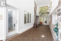 Front Entrance With Entrance To Loft & Garage - 