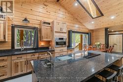 Custom American Hickory Cabinets and Large Island - 