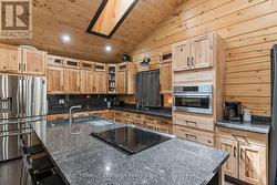 Custom American Hickory Cabinets and Large Island - 