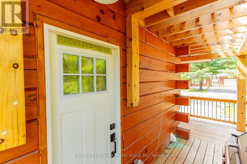 Side Door of Wrap around Porch - 1007 Winding Creek Road, Minden Hills (Anson), ON 