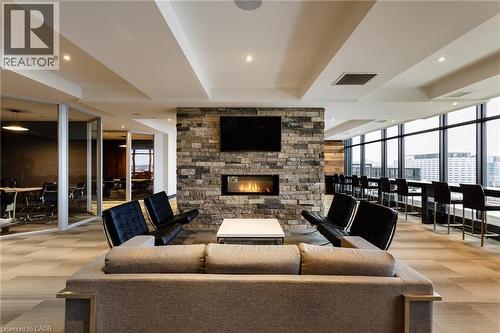 330 Phillip Street Unit# S709, Waterloo, ON - Indoor Photo Showing Living Room With Fireplace