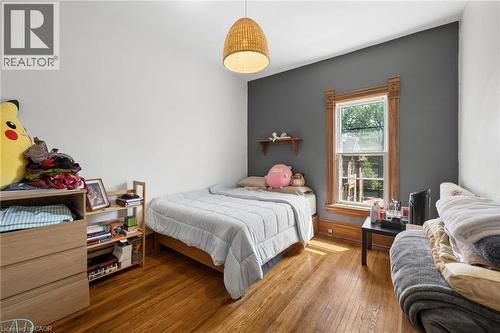 Hardwood flooring - 149 Young Street, Kitchener, ON - Indoor Photo Showing Bedroom