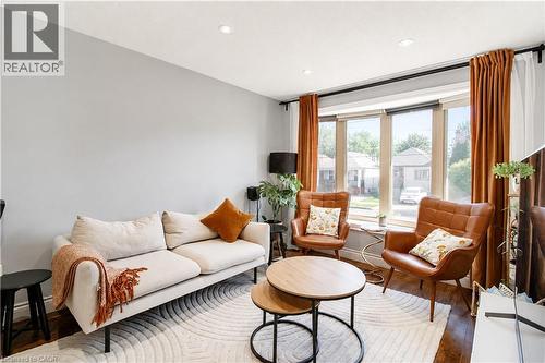 Living area featuring recessed lighting and wood-finish flooring - 103 Mcanulty Boulevard Unit# Upper, Hamilton, ON 