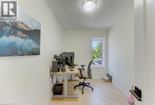 Dedicated room featuring light wood-finish flooring, neutral wall paint, and a single window - 11 Davidson Street, Cambridge, ON 