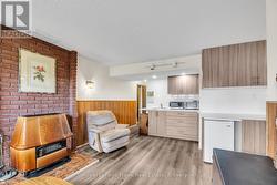 Rec room w/woodburning fireplace - 