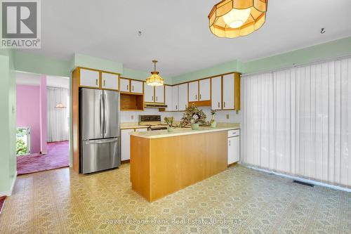 Kitchen with walkout to large deck - 311 Cumberland Court, Oshawa (Donevan), ON 