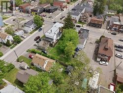 Aerial perspective showcasing a residential and commercial area with varied building styles - 