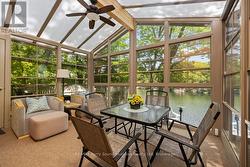 Fabulous screened porch overlooks the water - 