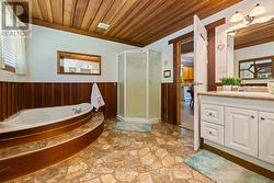 Separate soaker tub & shower, dual sinks - 