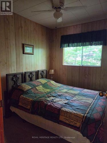 **Bedroom 5** - 1160 Sunset Strip Lane, Frontenac, ON - Indoor Photo Showing Bedroom