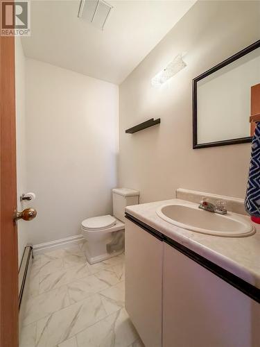 Recreation room with half bathroom - 51-53 Creston Boulevard, Marystown, NL 