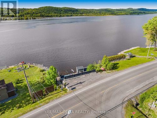 View of upper level, parking area, stairs. - 162 Front Road W, Champlain, ON 
