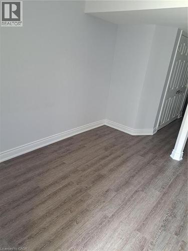 Wood-finish flooring throughout - 2240 Headon Road Unit# Lower, Burlington, ON 